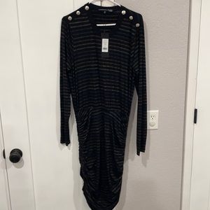 Veronica Beard long sleeve black jersey dress with metallic stripes.